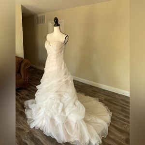 New. Unused. Casablanca bridal gown. Chmpgn/ivory ruffled. Sweetheart neckline.